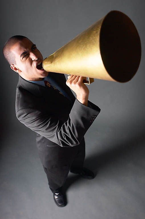 angry-businessman-yelling-into-bullhorn-1-1