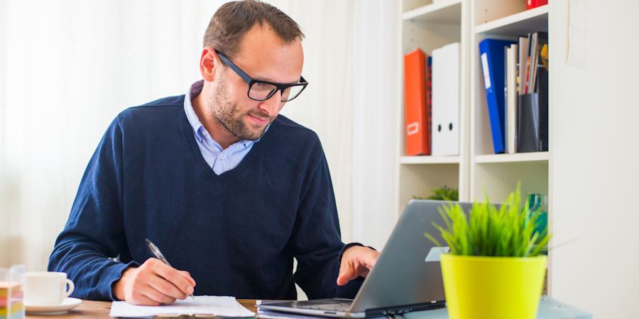 man working at laptop